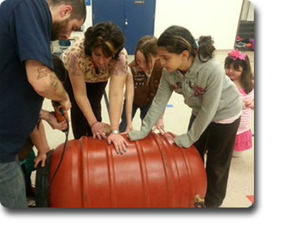 Girl Scouts build Rain barrels w Joshua