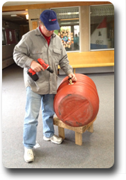 Pastor Paul assemble as Rain barrel after the workshop